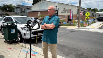 Baltimore County council member Izzy Patoka speaks at a press conference defending a campaign flyer featuring photos of council candidates.