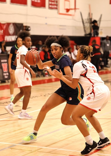 Poly basketball Trinity Massenburg