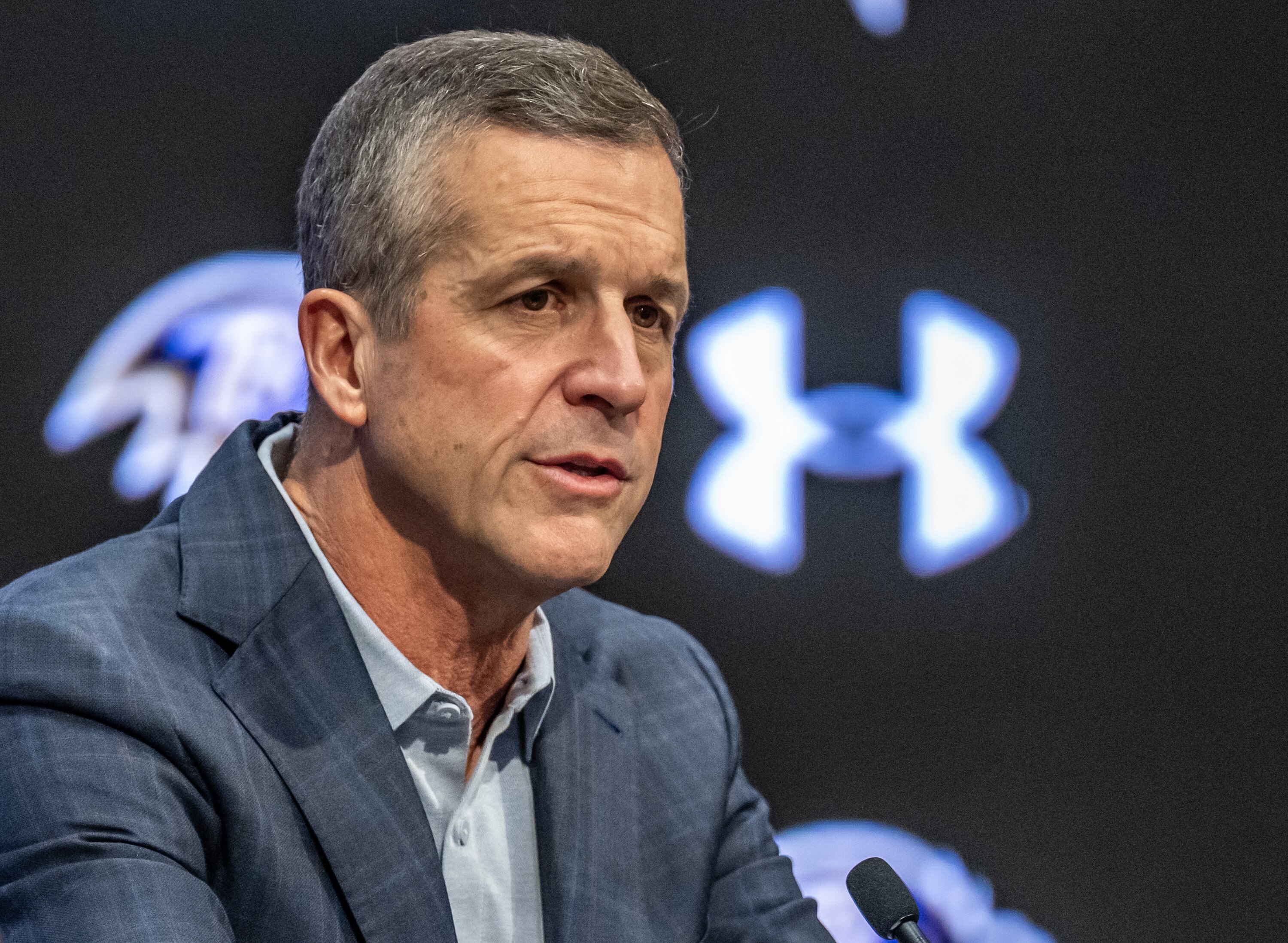 Ravens coach John Harbaugh takes questions during a season review press conference at the Under Armour Performance Center.