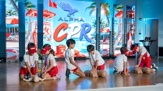 Alpha School students are showing the the skills they learned during a CPR workshop.