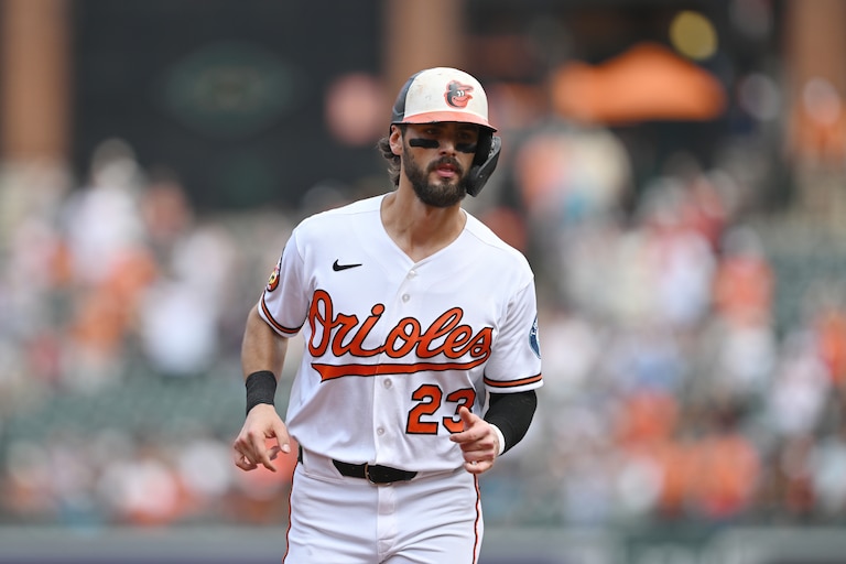 Orioles' Blaze Alexander jogs to home plate to score on a home run hit by Leody Taveras in Sunday's game against the Royals.