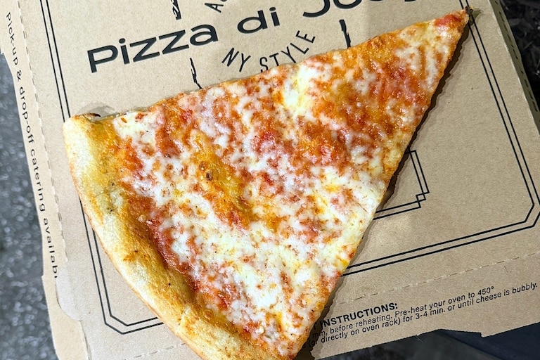 Pizza Di Joey has pizzas so big they barely fit through the window at Cross Street Market.