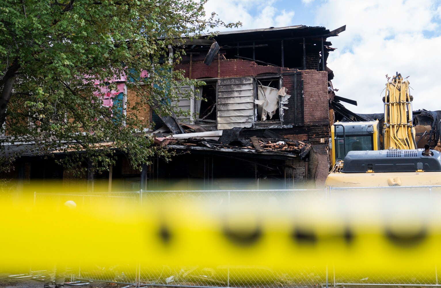 A man has been charged with setting three fires that burned the same street in Hampden.