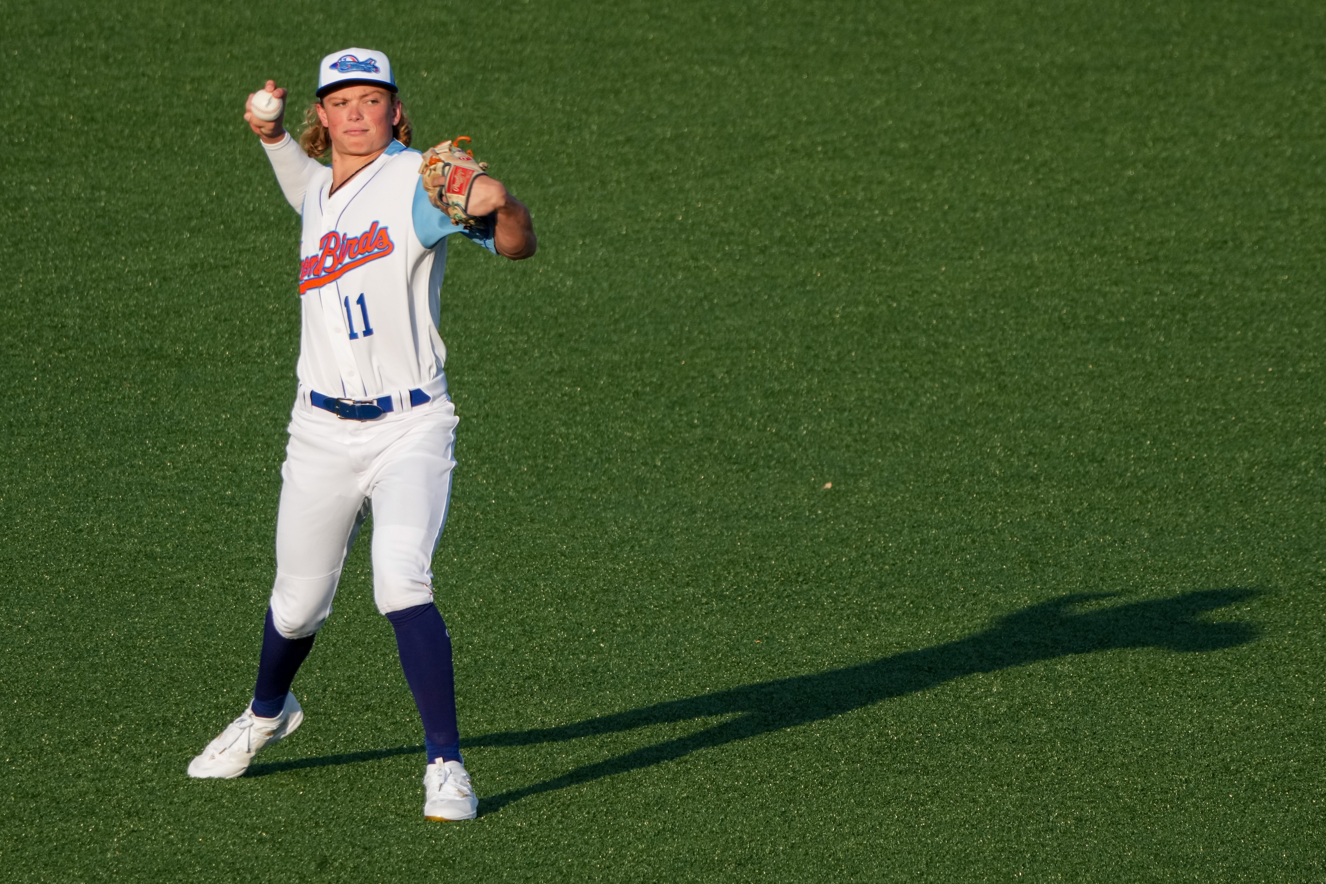 Aberdeen IronBirds shortstop Jackson Holliday (11) tosses the ball to a teammate before a game against the Hudson Valley Renegades at Leidos Field at Ripken Stadium on Tuesday, May 9. This game against the Renegades was Holliday’s home debut for the IronBirds.
