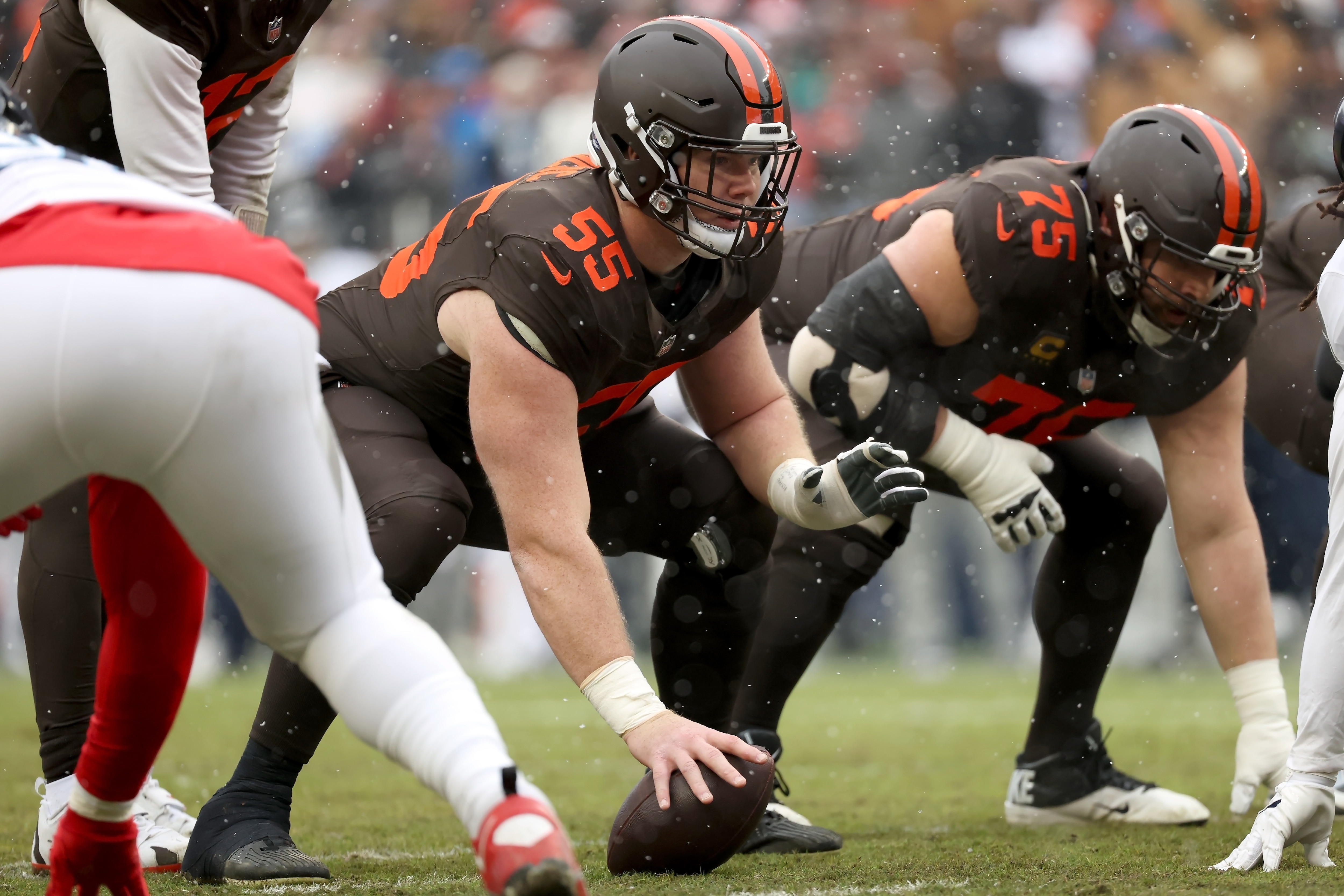 Former Cleveland Browns center Ethan Pocic (55) lines up for a play during a game against the Tennessee Titans on Dec. 7, 2025.