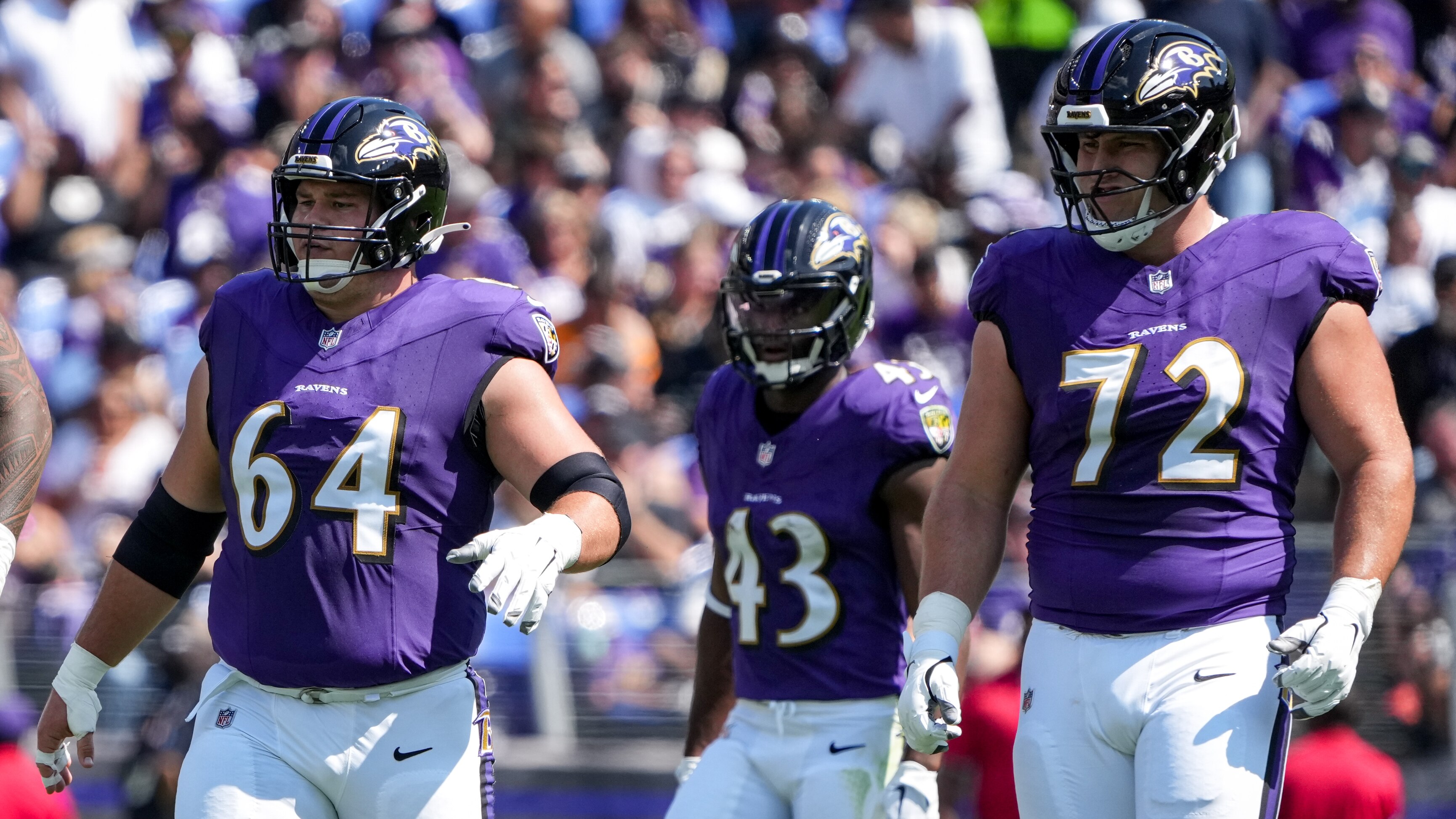 Ravens center Tyler Linderbaum (64) and guard Andrew Vorhees (72) line up during a game against the Las Vegas Raiders.