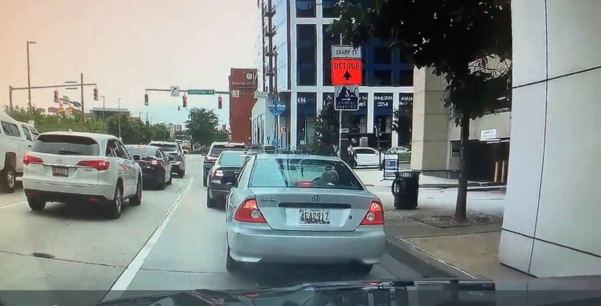 Screenshot from a driver’s dashcam footage.  The shooting occurred near the blue Interstate 95/395 sign.
