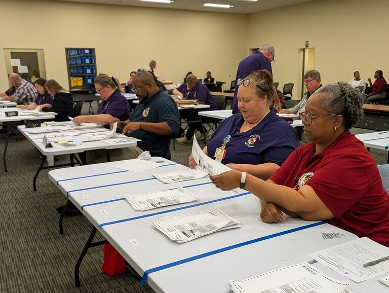 Employees at the Anne Arundel County Board of Elections office in Glen Burnie hand-count ballots on Sept. 25, 2025 in the Annapolis primary.