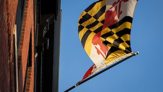 A Maryland Flag waves in the wind.