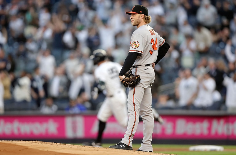 Orioles starting pitcher Shane Baz reacts after surrendering a two-run home run to New York Yankees outfielder Aaron Judge in the first inning of Monday night's game.