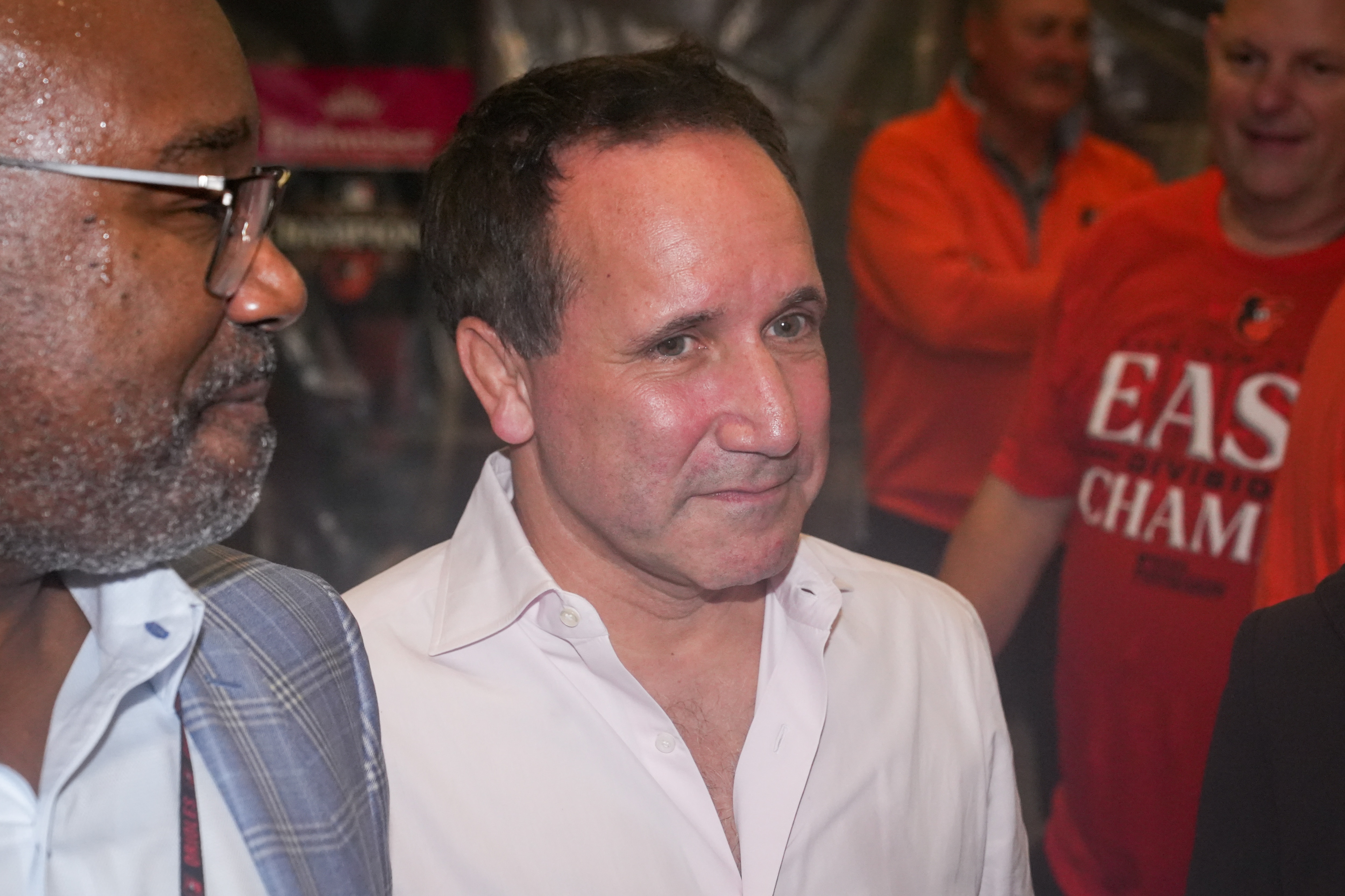 Orioles chair and managing partner John Angelos celebrates in the locker room after the team clinched the AL East on Sept. 28.