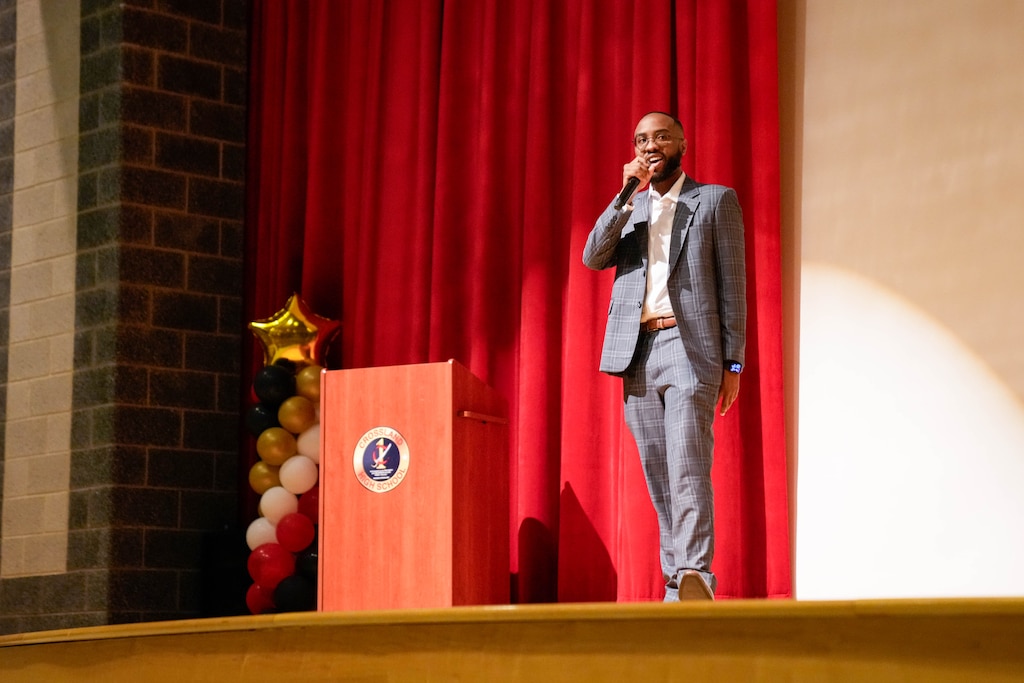 Romel Williams, founder and president of Joan’s House, gives remarks during their Student Leadership Academy graduation ceremony at Crossland High School in Camp Springs, Md. on Wednesday, June 3, 2026.