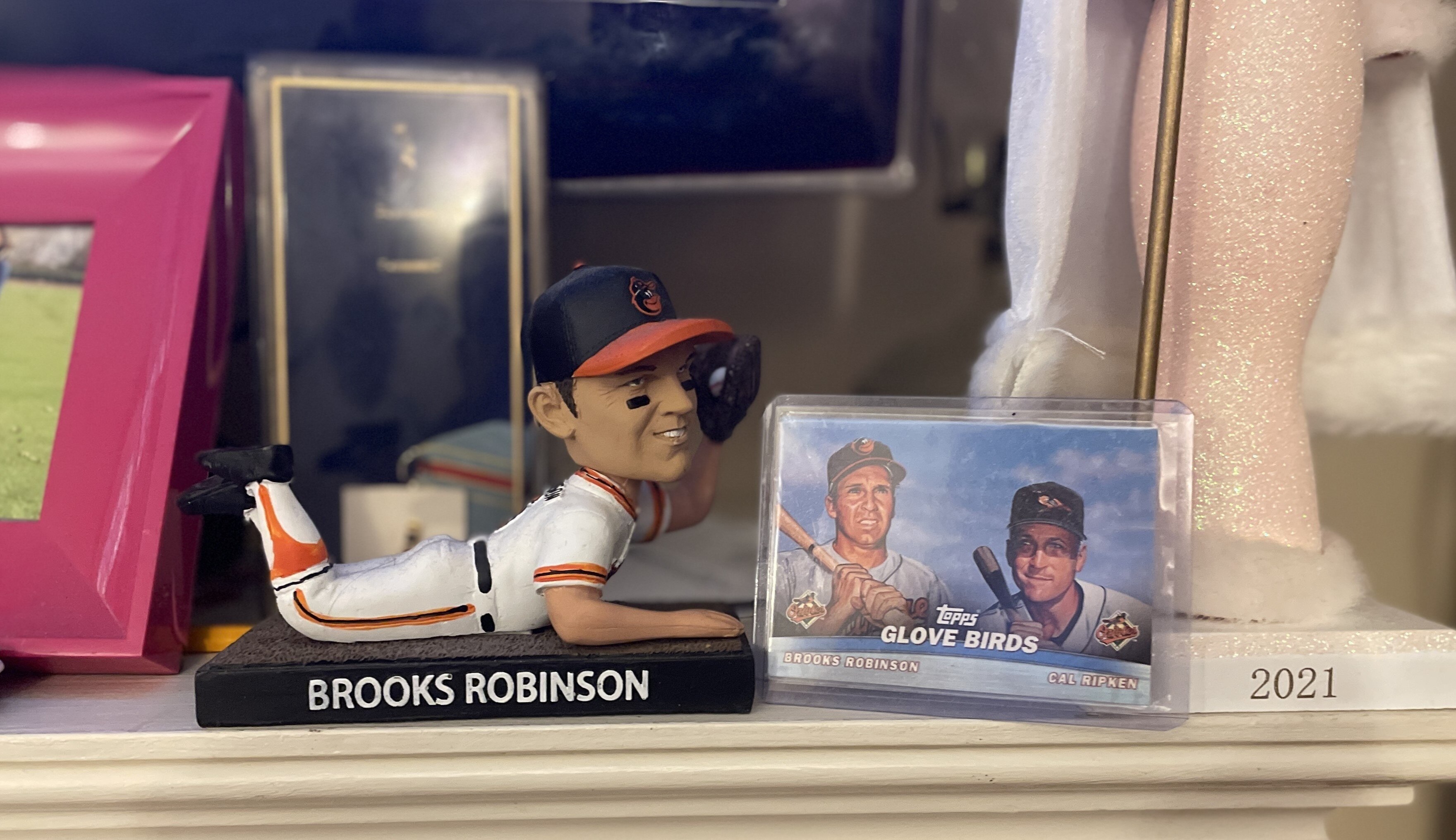 Brooks Robinson memorabilia lines Leslie Gray Streeter’s mantle.