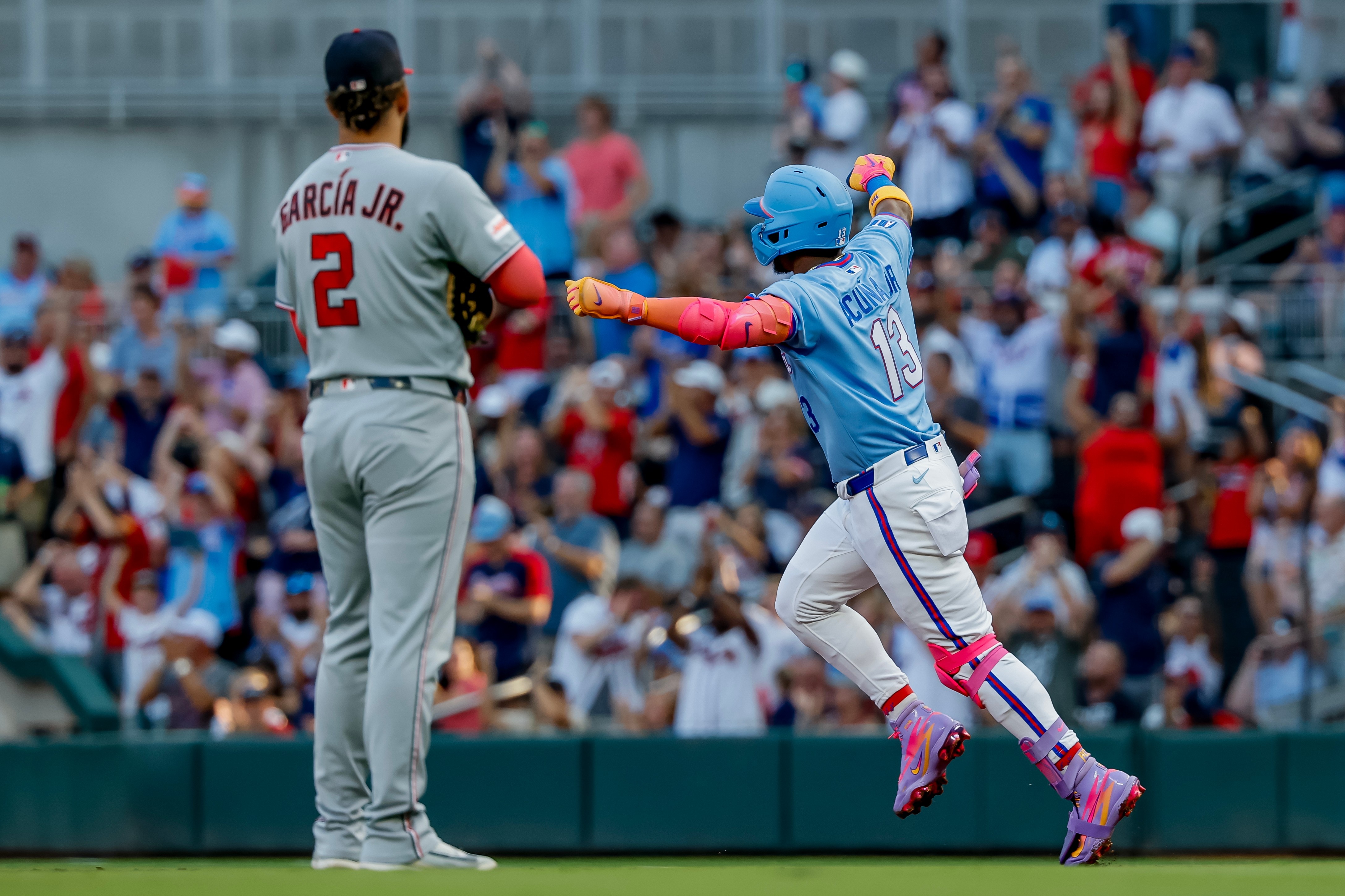 Nationals first baseman Luis García Jr. watches the Braves’ Ronald Acuña Jr. round the bases on his home run in the first inning.