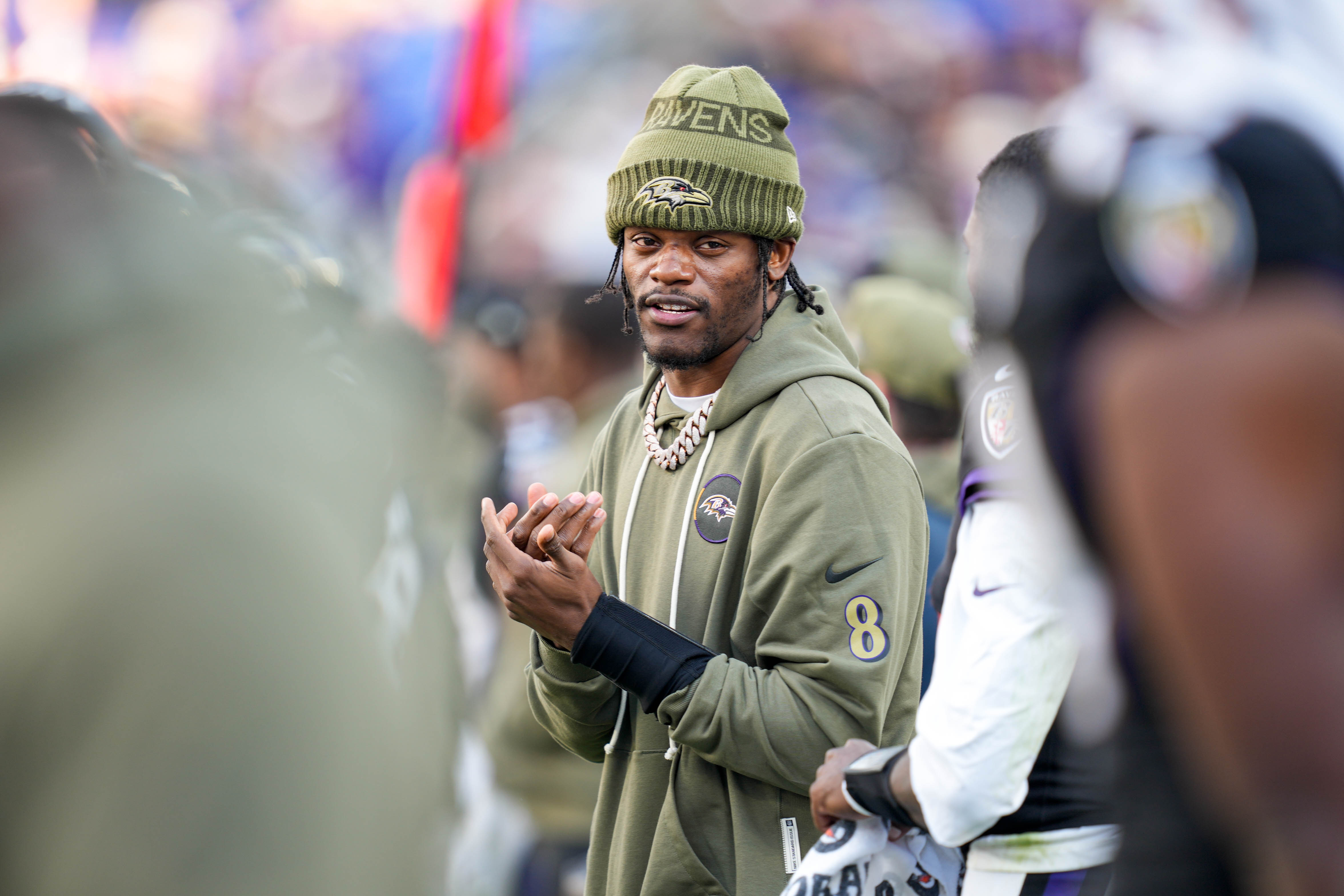 Baltimore Ravens quarterback Lamar Jackson (8) watches from the sidelines in the fourth quarter of a game against the Chicago Bears at M&T Bank Stadium in Baltimore, Md., on Sunday, Oct. 26, 2025.