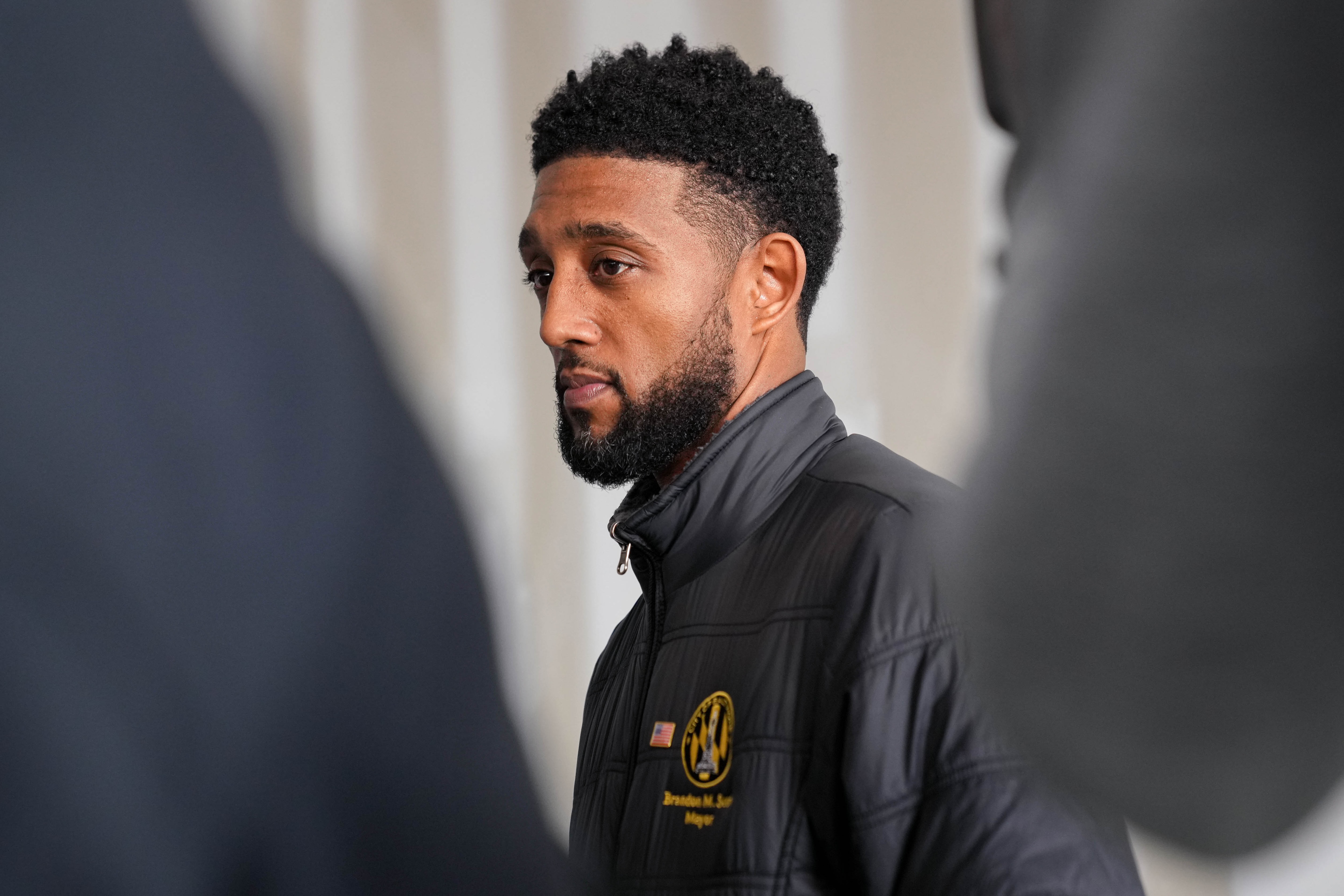 Baltimore Mayor Brandon Scott at a news conference in February. On Wednesday, he urged residents to stand up for the city.