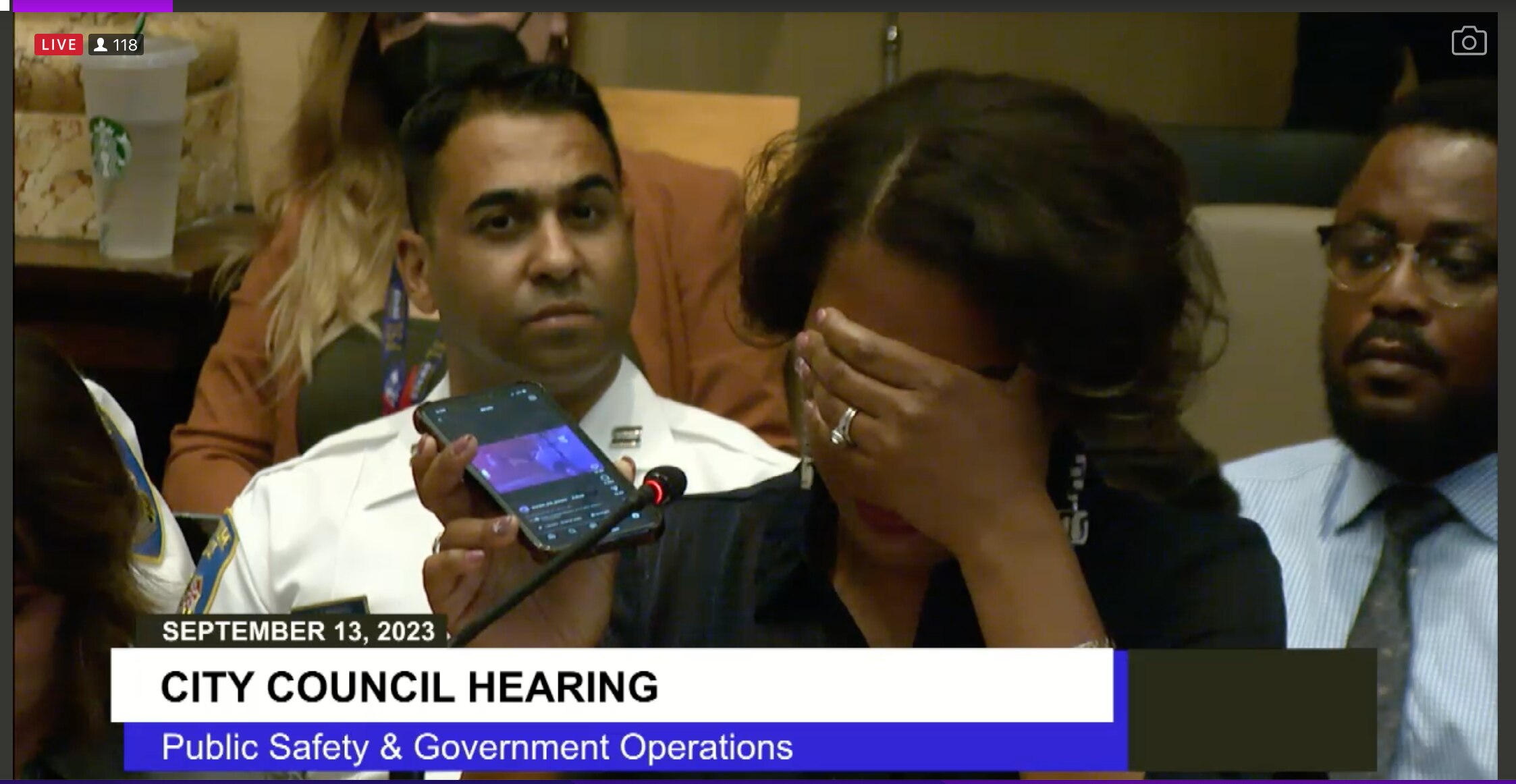 Krystal Gonzalez, mother of 18-year-old Aaliyah Gonzalez, who was shot and killed at the Brooklyn Day event, plays a video of her daughter's body being discovered for the City Council. She said the video haunts her.