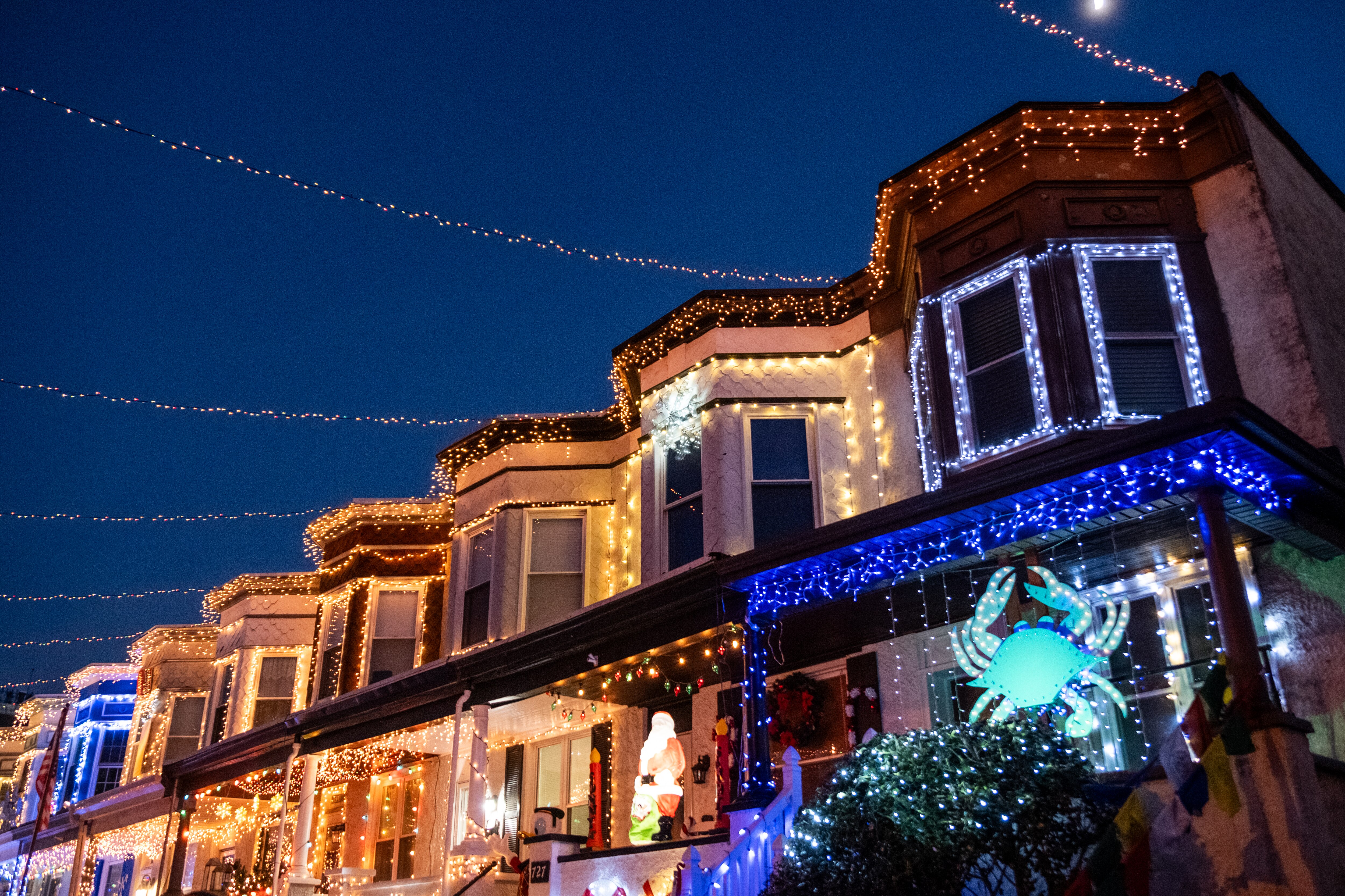 Homes are decorated in holiday lights at Hampden's Miracle on 34th Street annual display on Sunday, December 8, 2024.