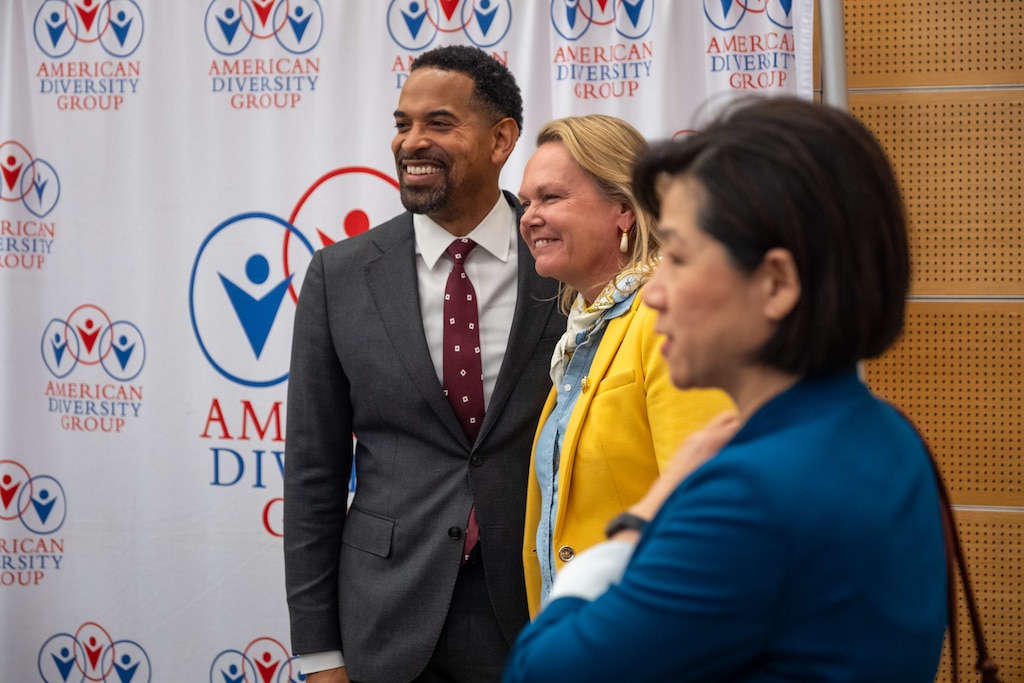 Will Jawando (center), one of three County Council members running for county executive in Montgomery County, attends a Community Wellness and Resource Fair held by Rep. April McClain Delaney (right) and the American Diversity Group at Montgomery College in Germantown, Md.