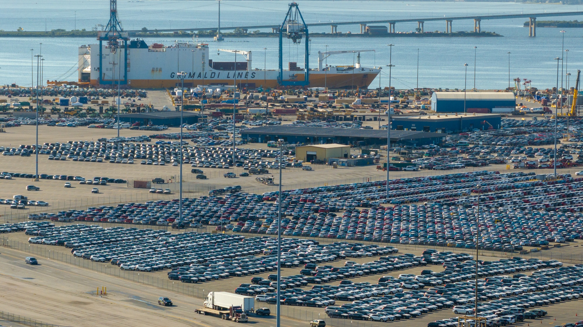 For years the Port of Baltimore has led the country in vehicle imports. New cars are seen at the Dundalk Marine Terminal. 