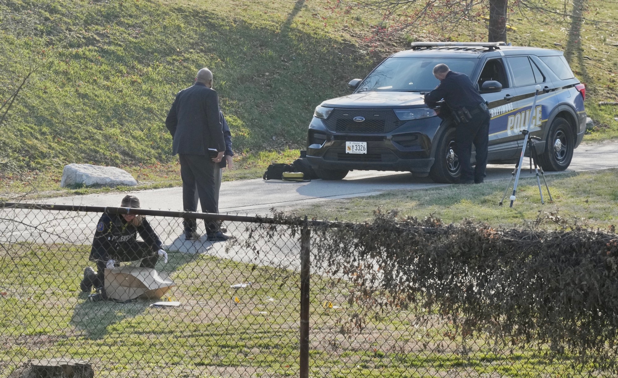 Scenes from the aftermath of a shooting at a playground adjacent to Patterson High School on March 6, 2023.