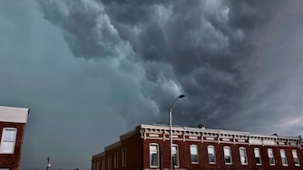 A large storm cloud looms over the Broadway East neighborhood on August 7, 2023.