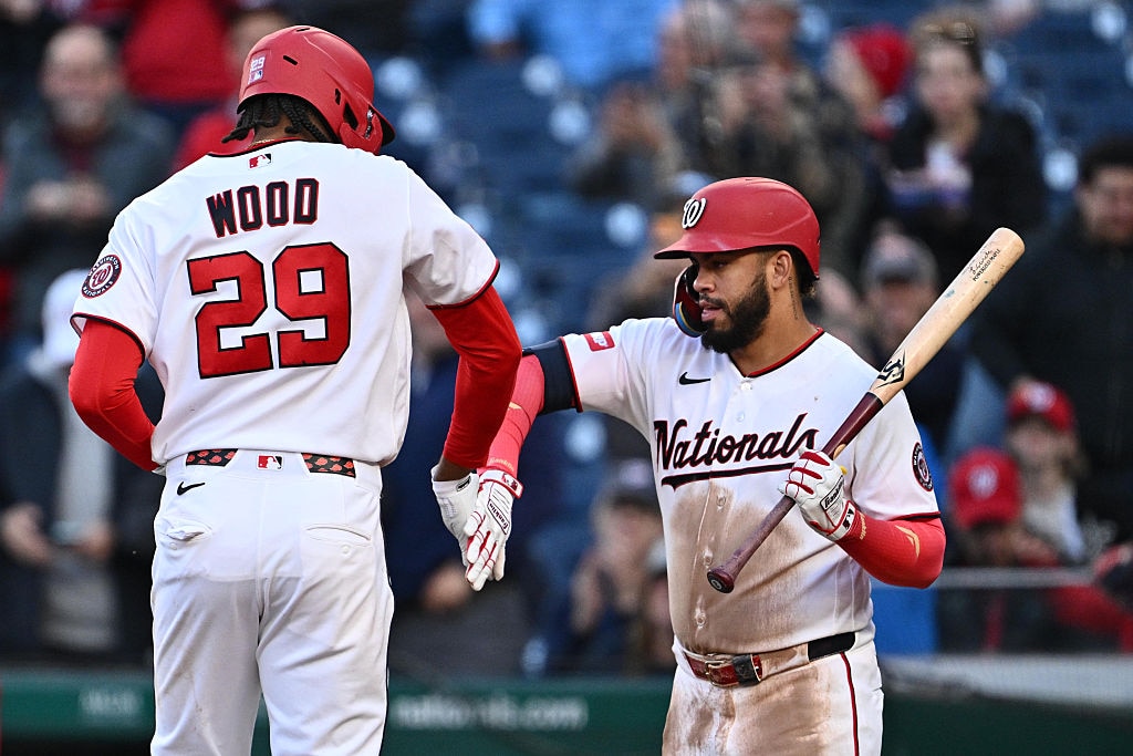 Washington Nationals right fielder James Wood celebrates with teammate Luis Garcia Jr. after hitting a home run in the second inning.