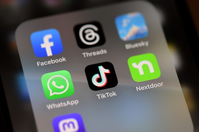 SAN ANSELMO, CALIFORNIA - DECEMBER 06: In this photo illustration, the TikTok logo is displayed on an iPhone screen on December 06, 2024 in San Anselmo, California. A three-judge panel of the U.S. Court of Appeals in Washington, D.C., has upheld a law mandating China-based ByteDance to sell the popular social media app TikTok or face a ban in the United States. ByteDance has until January 19, 2025 to sell the company. (Photo Illustration by Justin Sullivan/Getty Images)