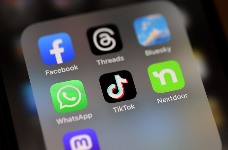 SAN ANSELMO, CALIFORNIA - DECEMBER 06: In this photo illustration, the TikTok logo is displayed on an iPhone screen on December 06, 2024 in San Anselmo, California. A three-judge panel of the U.S. Court of Appeals in Washington, D.C., has upheld a law mandating China-based ByteDance to sell the popular social media app TikTok or face a ban in the United States. ByteDance has until January 19, 2025 to sell the company. (Photo Illustration by Justin Sullivan/Getty Images)