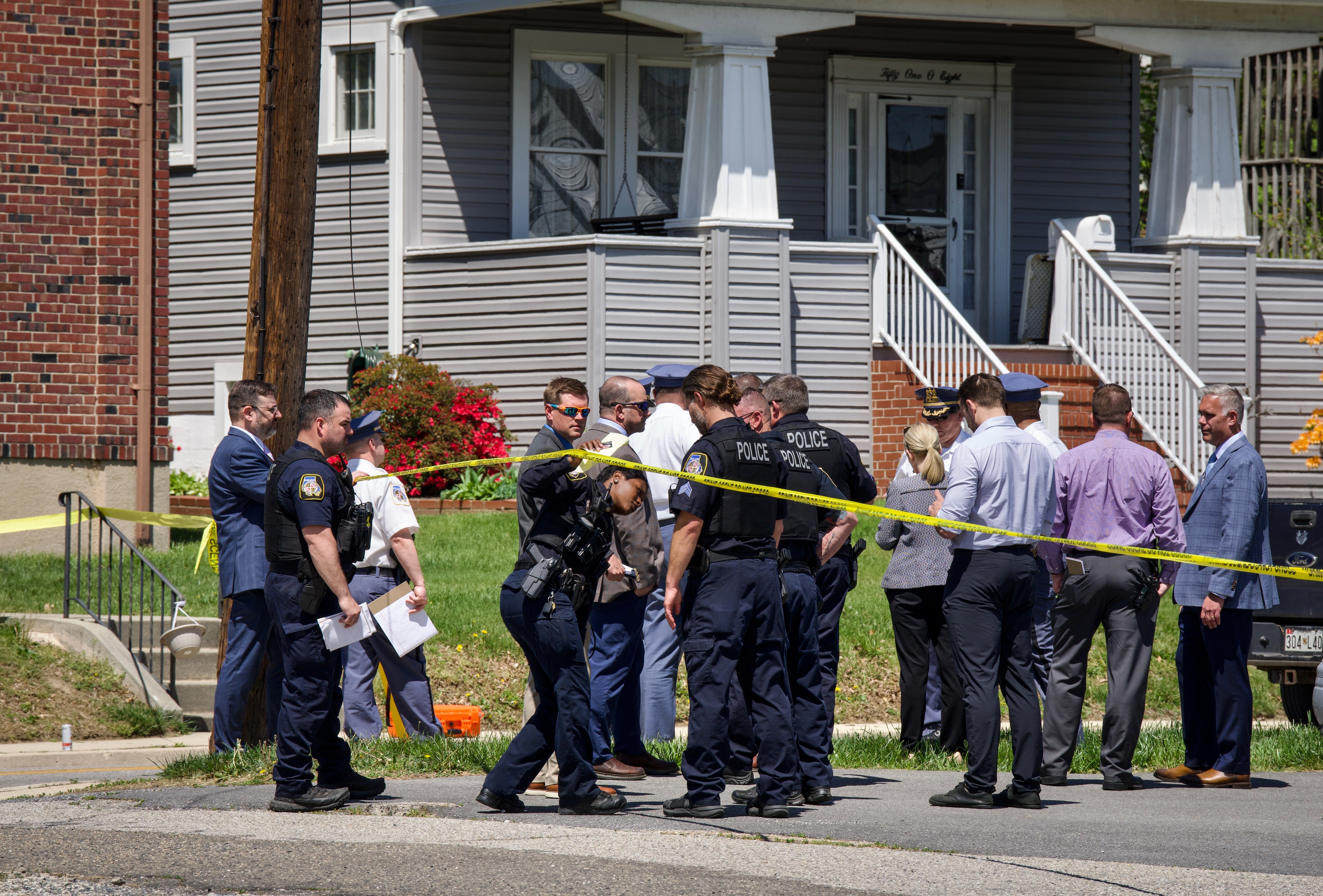 Law enforcement officers respond to a Baltimore County police-involved shooting on Leeds Avenue in Arbutus on Wednesday.