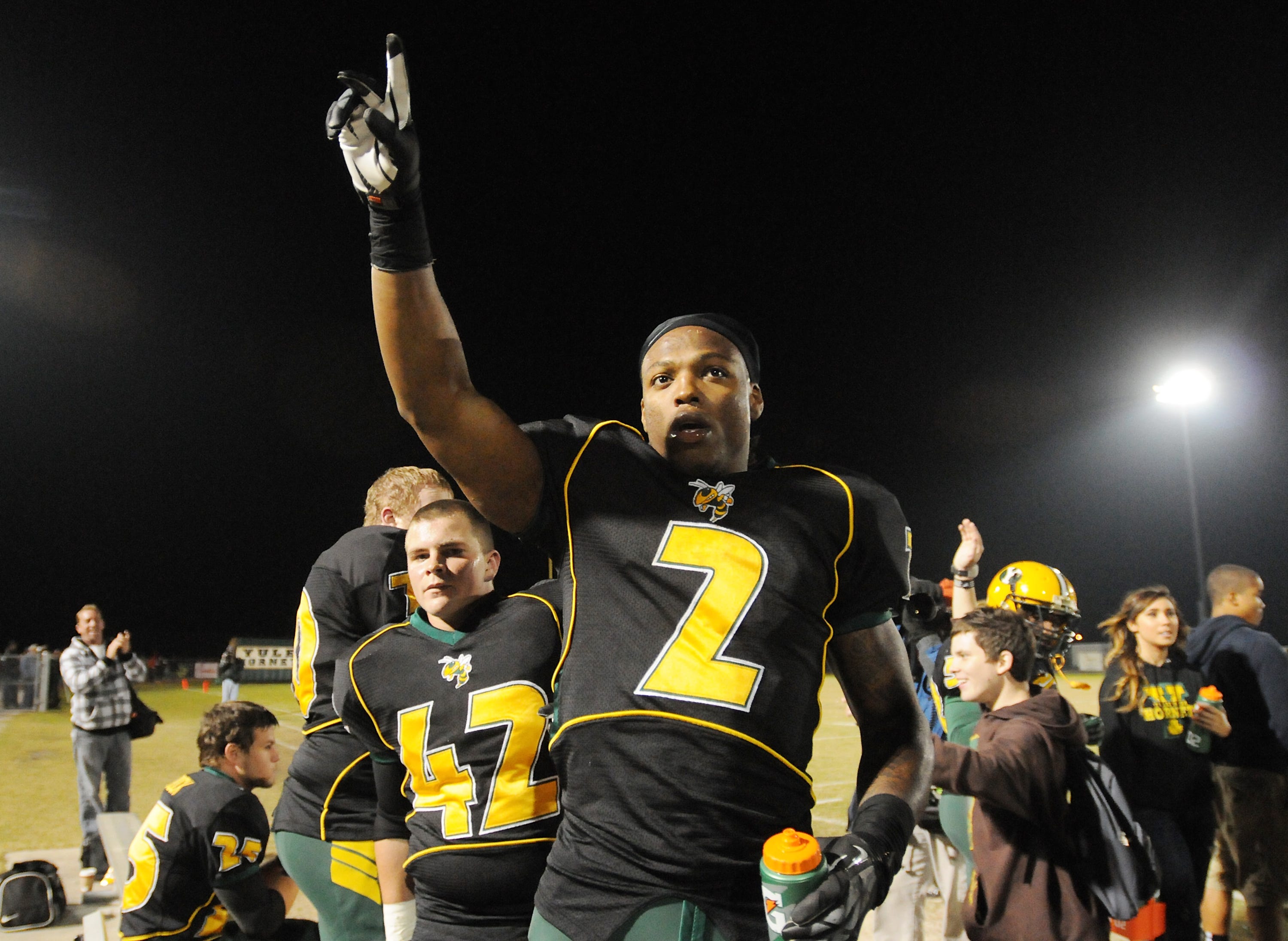 Nov 16, 2012; Jacksonville, FL, USA; FILE PHOTO; Yulee's Derrick Henry, (2), acknowledges the crowd after his second quarter record setting touchdown run as Yulee High School takes on Taylor County in the Region 1-4A semifinals at Yulee High School Friday night November 16, 2012. On that play the Yulee star running back Derrick Henry would break the national rushing yard record of 11,232 yards from 1950-53 set by Ken Hall.