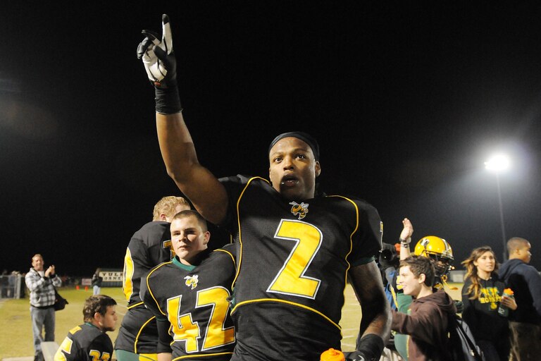 Nov 16, 2012; Jacksonville, FL, USA; FILE PHOTO; Yulee's Derrick Henry, (2), acknowledges the crowd after his second quarter record setting touchdown run as Yulee High School takes on Taylor County in the Region 1-4A semifinals at Yulee High School Friday night November 16, 2012. On that play the Yulee star running back Derrick Henry would break the national rushing yard record of 11,232 yards from 1950-53 set by Ken Hall.