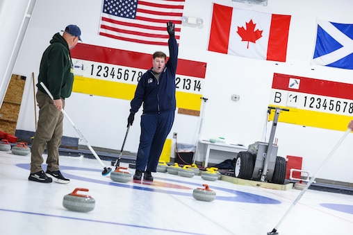 SATURDAY, FEBRUARY 21Β - A member of the Potomac Curling Club instructs first-time curlers on sweeping during an open house at the club in Laurel, Md. Interest in the sport has grown following the recent 2026 Winter Olympics in Cortina, Italy, drawing new participants to the Maryland club.