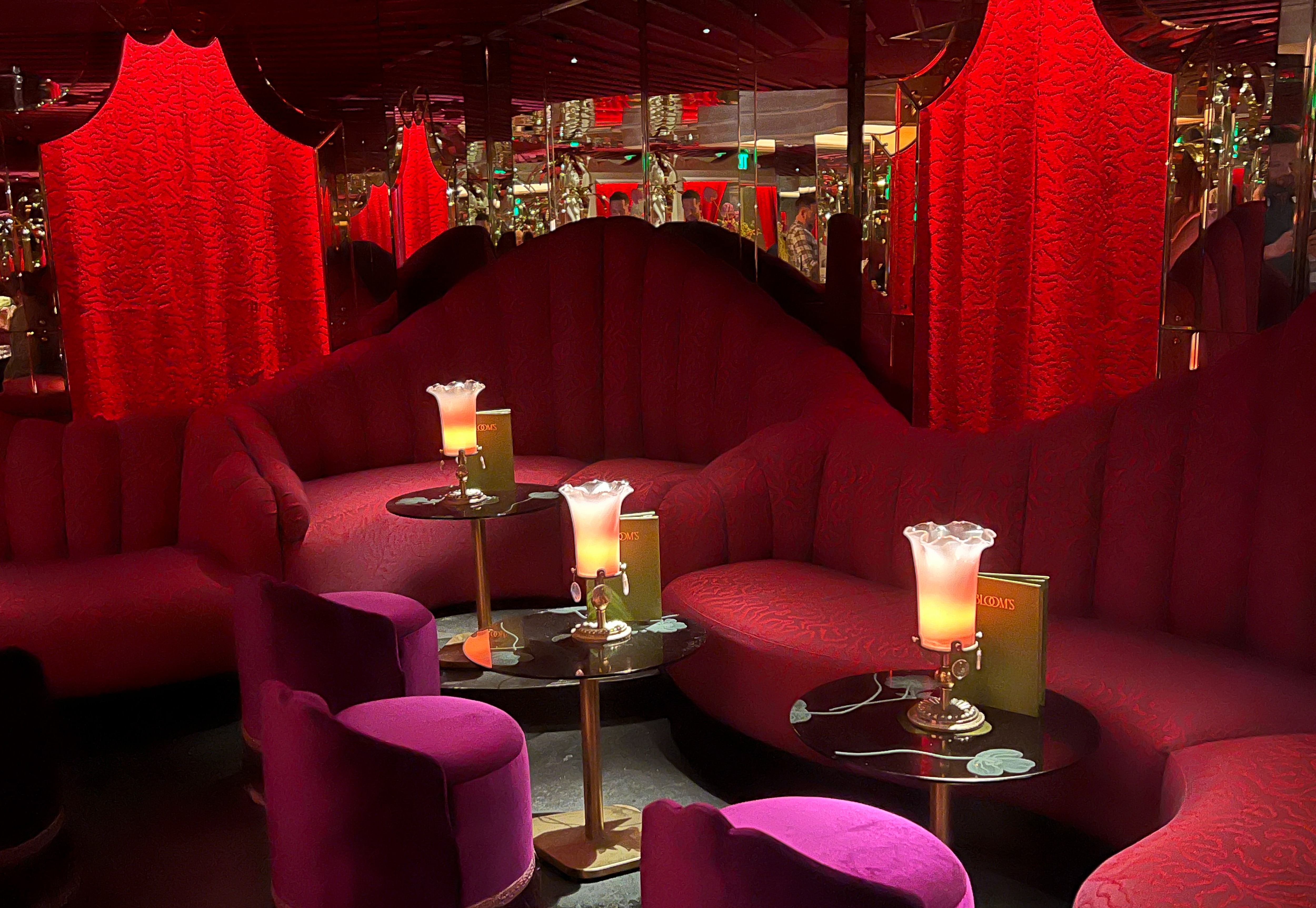 Bloom’s
2 E. Read St., Baltimore

Sexy, swanky, and stylish, Bloom’s is one of the most Insta-Tok-able new bars in Baltimore - but also one of the most classic. Surrounded by mirrors, red velvet banquets, and tall metallic palm trees.