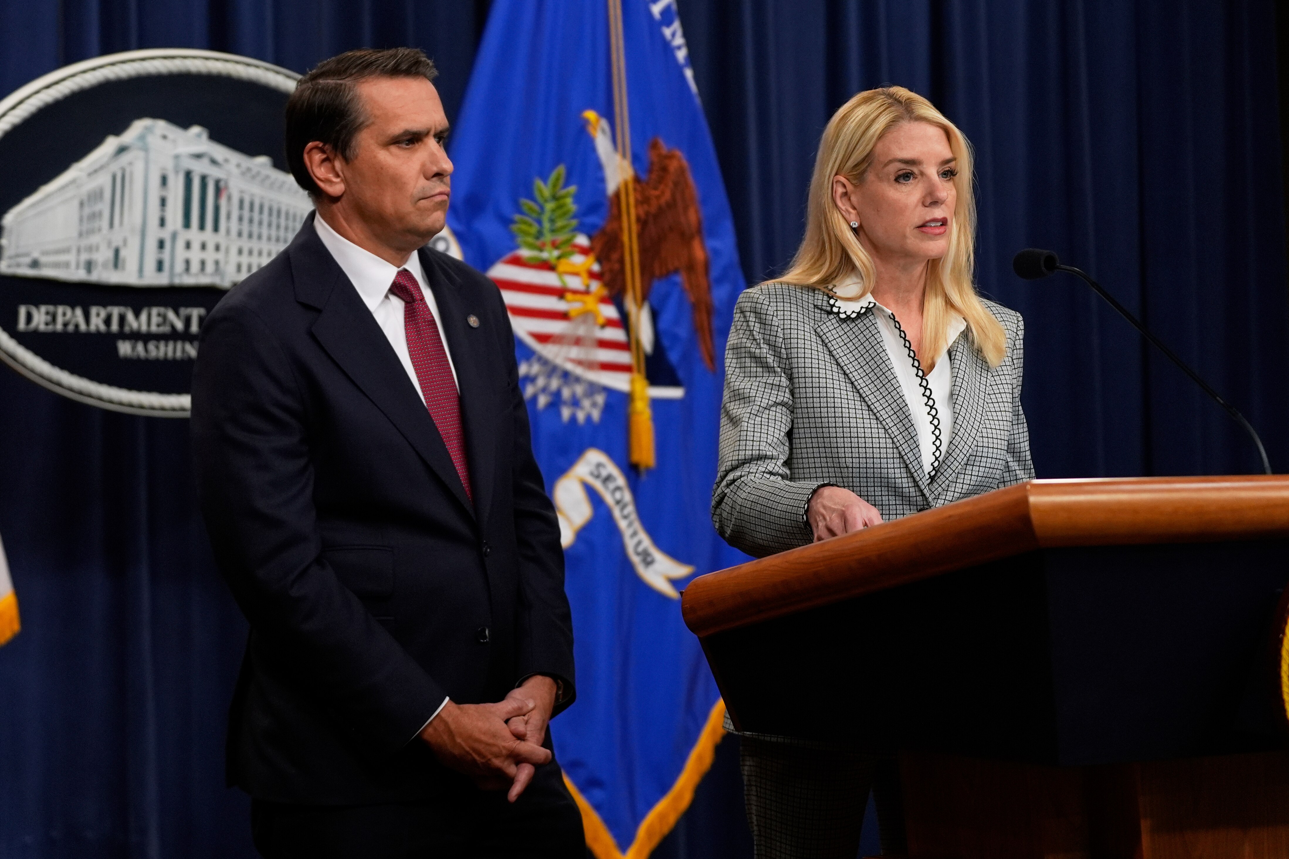Attorney General Pam Bondi speaks as Deputy Attorney General Todd Blanche listens during a news conference about Kilmar Abrego Garcia at the Justice Department, Friday June 6, 2025, in Washington.