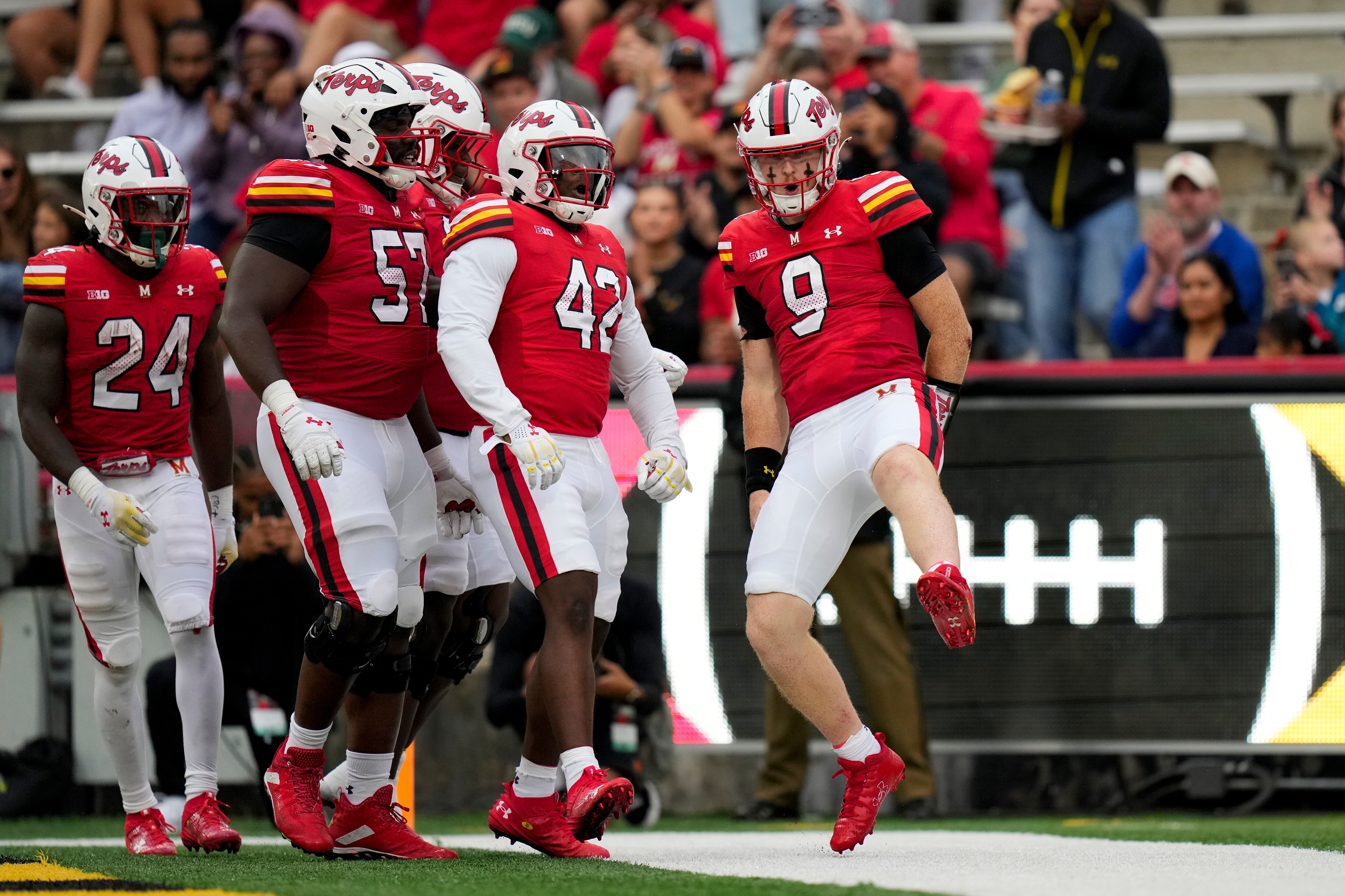 Maryland quarterback Billy Edwards Jr. (right) celebrates a touchdown Saturday against Michigan State.