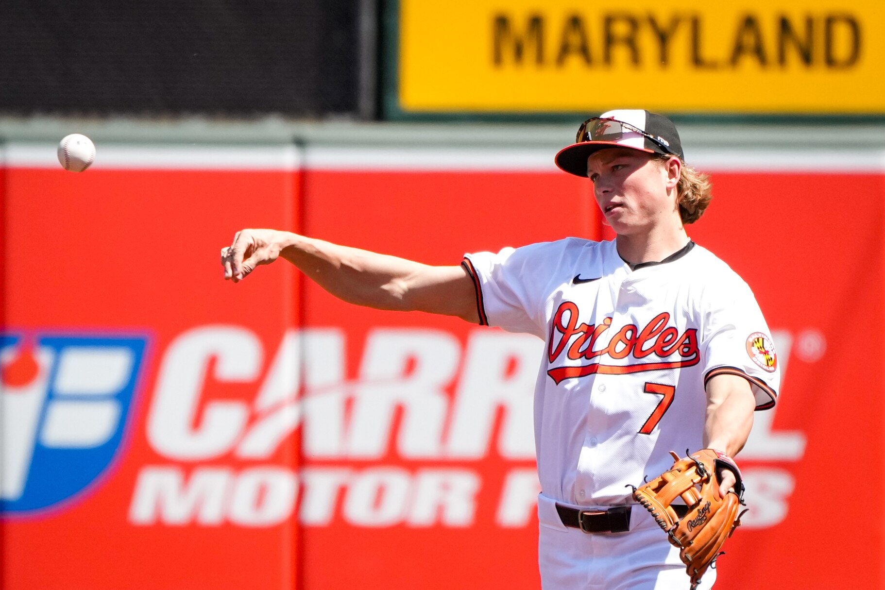 Baltimore Orioles second baseman Jackson Holliday (7) throws to a teammate between Milwaukee Brewers at-bats during game three of a series at Camden Yards on April 14, 2024. The Orioles beat the Brewers, 6-4, to avoid getting swept in the series.
