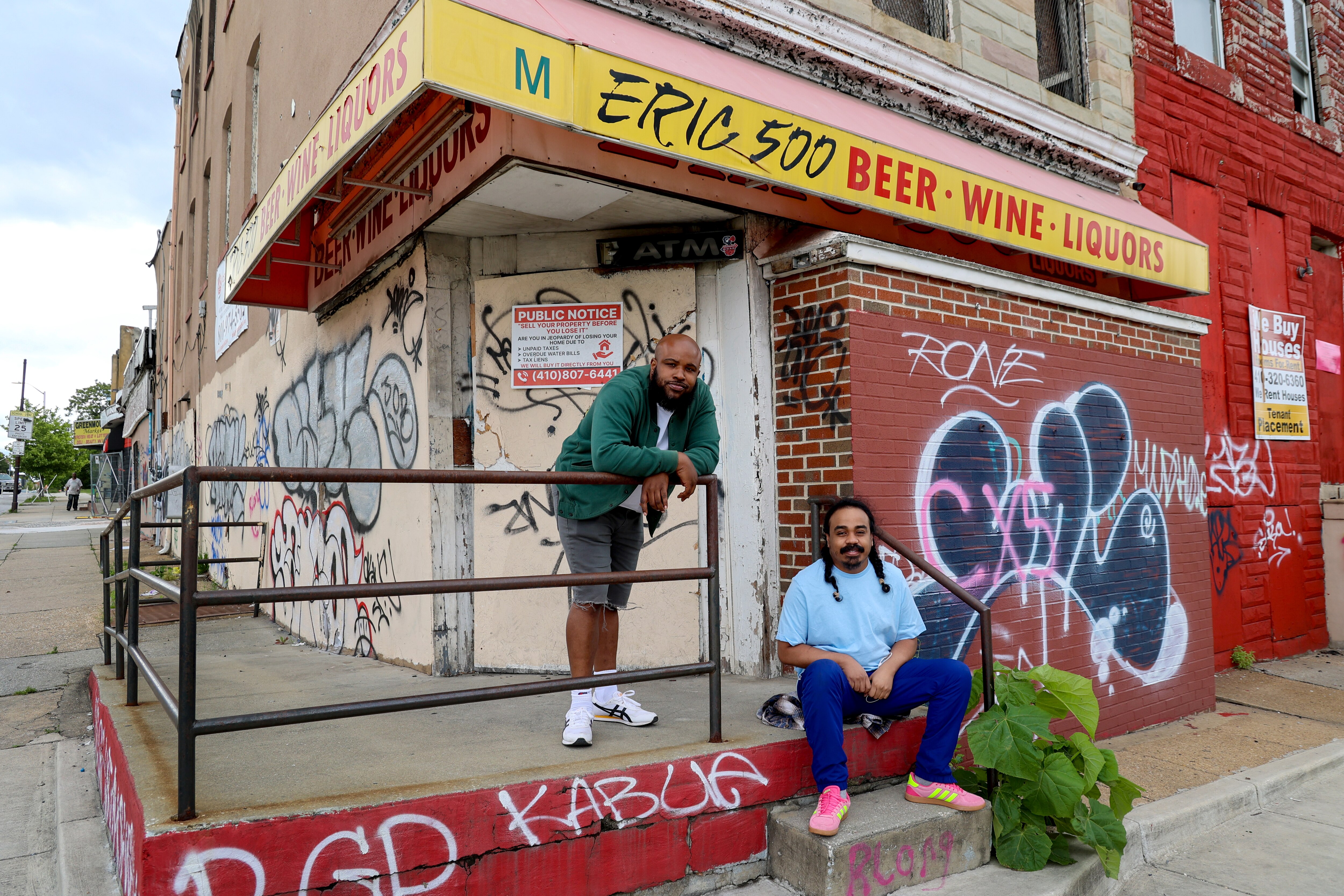 Brian Ennals, left, and Tariq “Infinity Knives” Ravelomanana in front of the shop Eric 500.