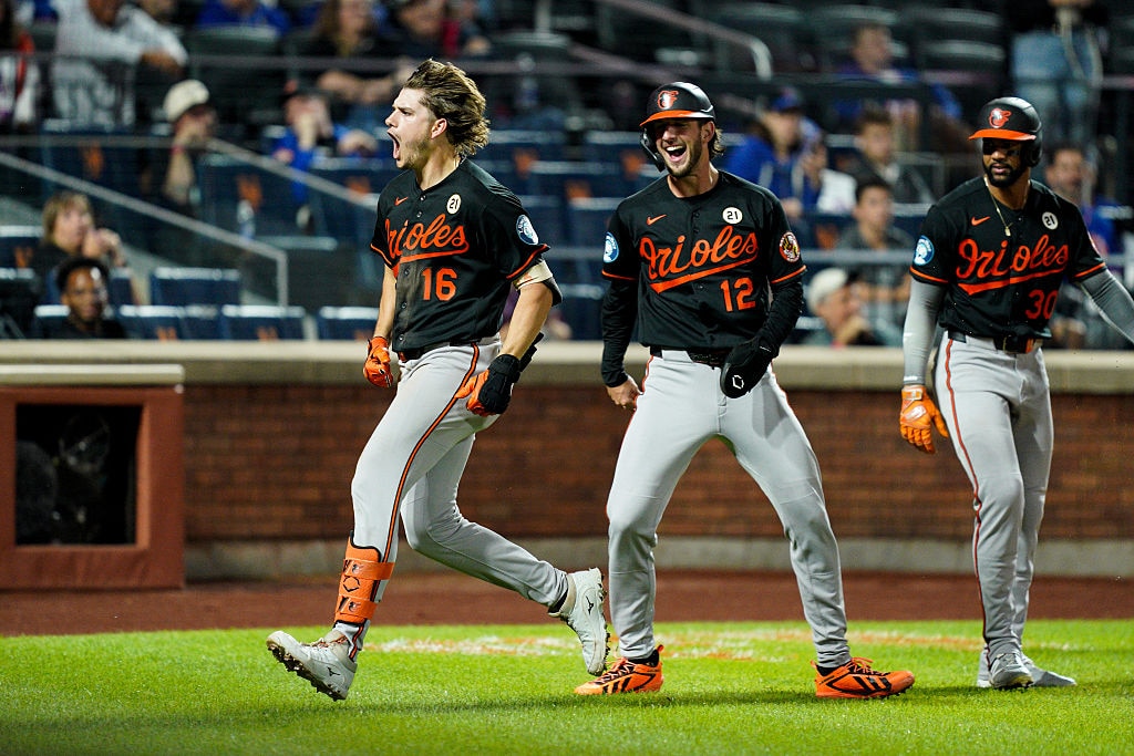 Orioles designated hitter Coby Mayo reacts after crossing home plate on his inside-the-park three-run home run against the New York Mets in the eleventh inning.