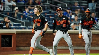Orioles designated hitter Coby Mayo reacts after crossing home plate on his inside-the-park three-run home run against the New York Mets in the eleventh inning.