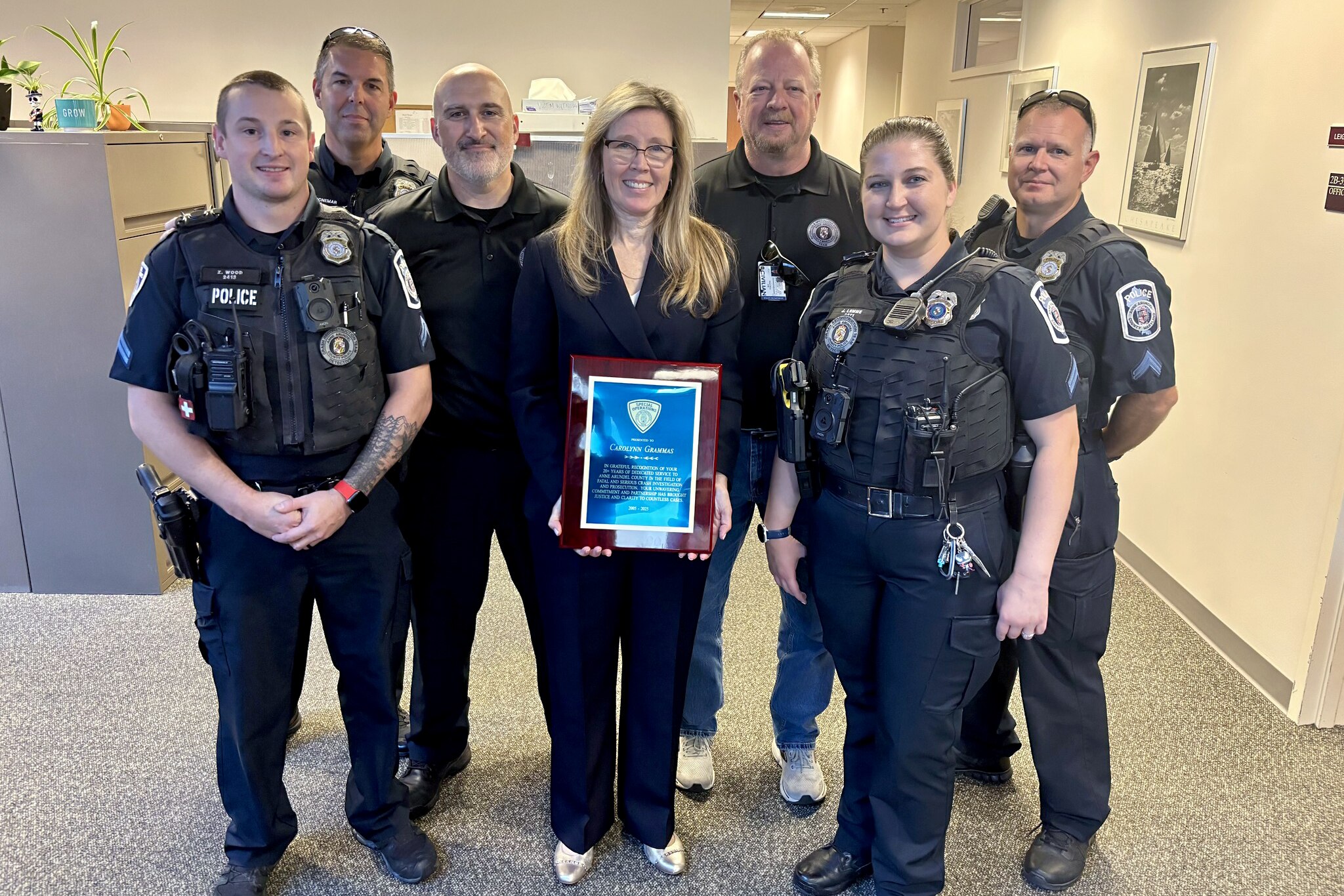 Carolynn Grammas, center, on her last day as Assistant State's Attorney for Anne Arundel County.