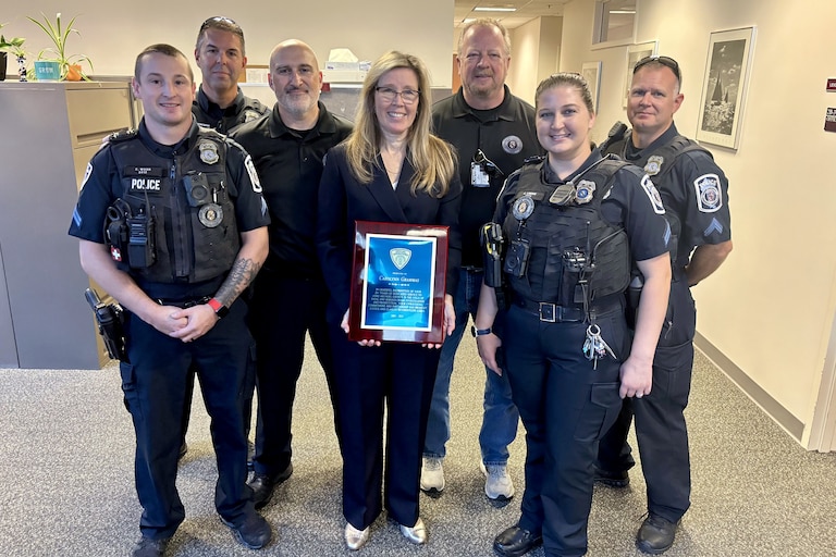 Carolynn Grammas, center, on her last day as Assistant State's Attorney for Anne Arundel County.