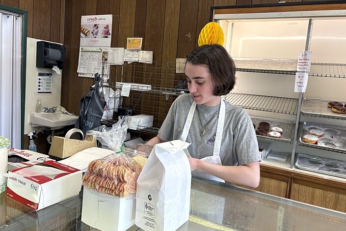 Towson University senior Keira Nelson has worked at Simon’s Bakery in Cockeysville for four years. Locals have many favorites, but the thin sugar cookies were ours.