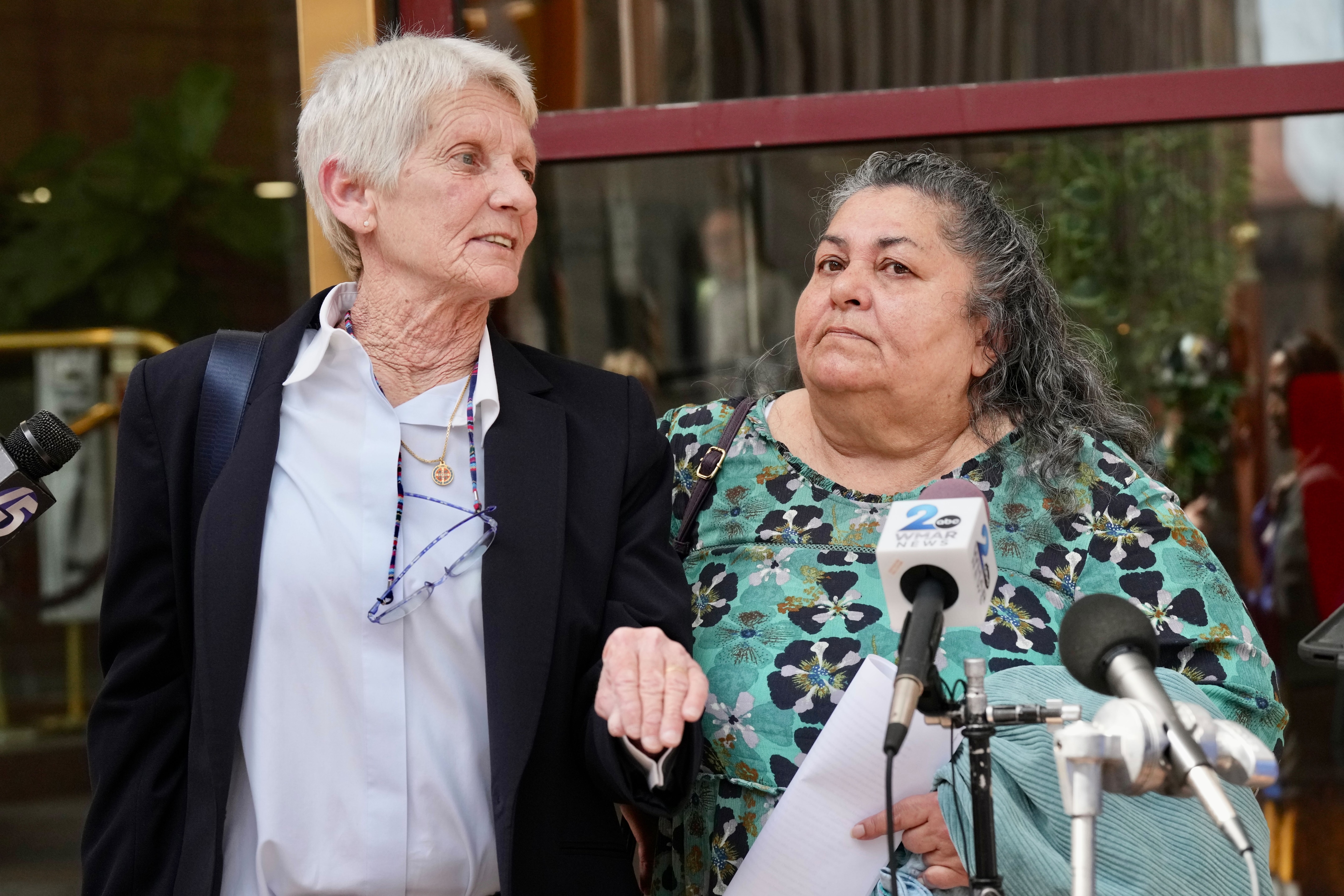 Liz Murphy (short hair) and Linda talks about the release of the  Catholic Church Investigation papers and hold a few pages extracted from the full report.