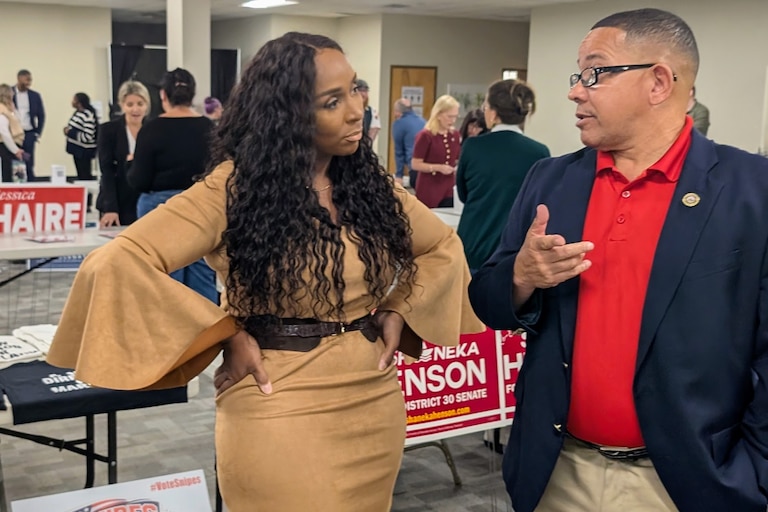 State Sen. Shaneka Henson talks with Del. Mike Rogers at an Oct. 6, 2026 voter forum in Gambrills. After being appointed to the seat, the former state delegate hopes to win a full term.