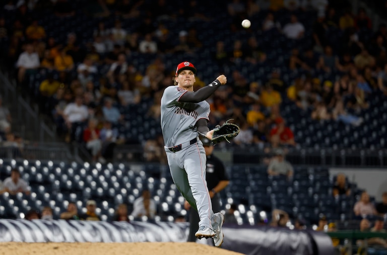 Brady House #12 of the Washington Nationals makes a throw to first in the sixth inning against the Pittsburgh Pirates at PNC Park on April 15, 2026 in Pittsburgh, Pennsylvania. All players are wearing the number 42 in honor of Jackie Robinson Day.