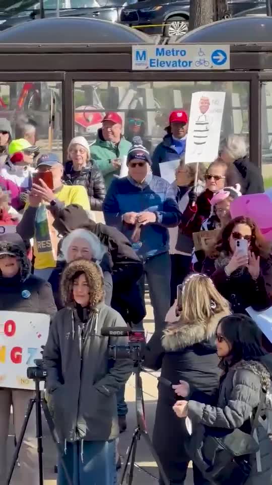Protesters outside the Medical Center metro station at the entrance of the National Institutes of Health (NIH).