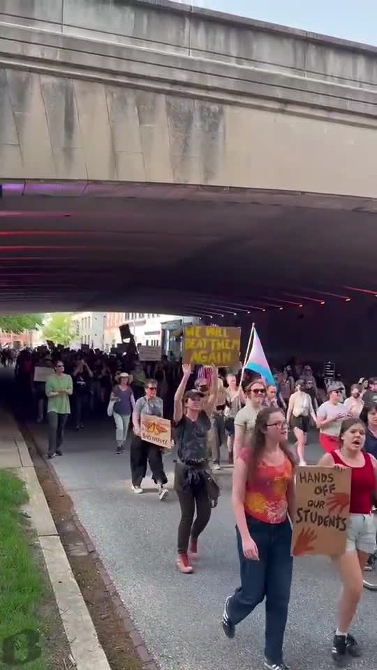 May Day protesters march down St. Paul in Baltimore