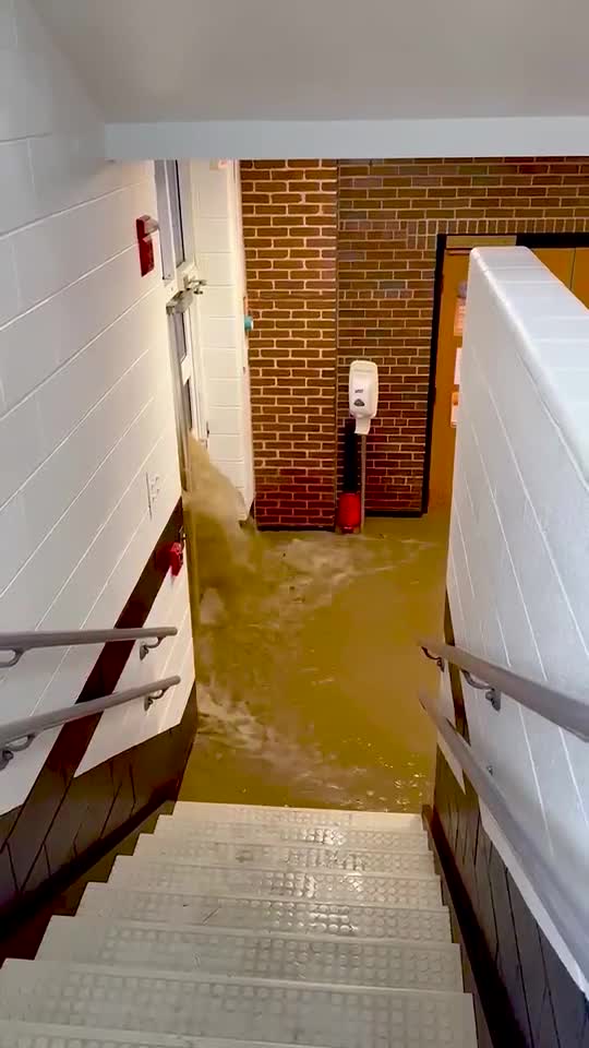 Floodwaters pour into the first floor of Westernport Elementary School. It came up nearly 7 feet in the lowest levels of the school. Courtesy of Karalee Martz